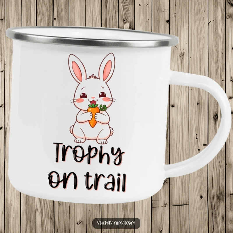 Funny camping mug depicting a happy rabbit holding a small carrot trophy, ideal for outdoor celebrations and wins.