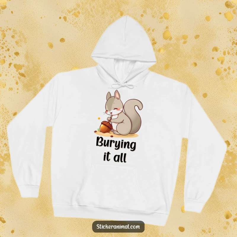 Funny hoodie illustrating a mischievous squirrel carefully burying a gleaming acorn, symbolizing hidden treasures and fun.
