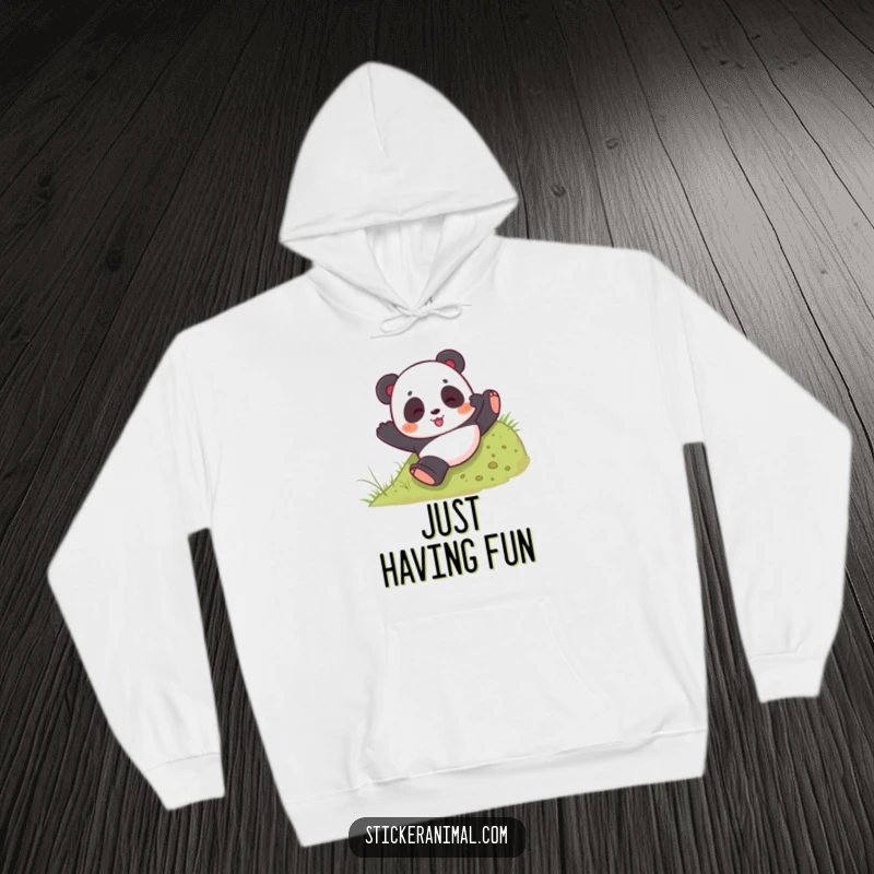 Funny hoodie with a playful panda bear tumbling down a grassy hill, offering warmth and a sense of playful abandon.