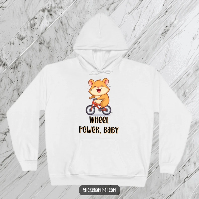 Funny hoodie shows a grinning hamster character spinning rapidly on a tiny bicycle, perfect for cozy speed.