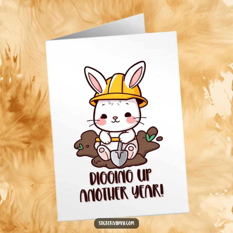 Funny free printable birthday card: A cute bunny in a construction helmet digs with a shovel. Ideal for DIY enthusiasts.