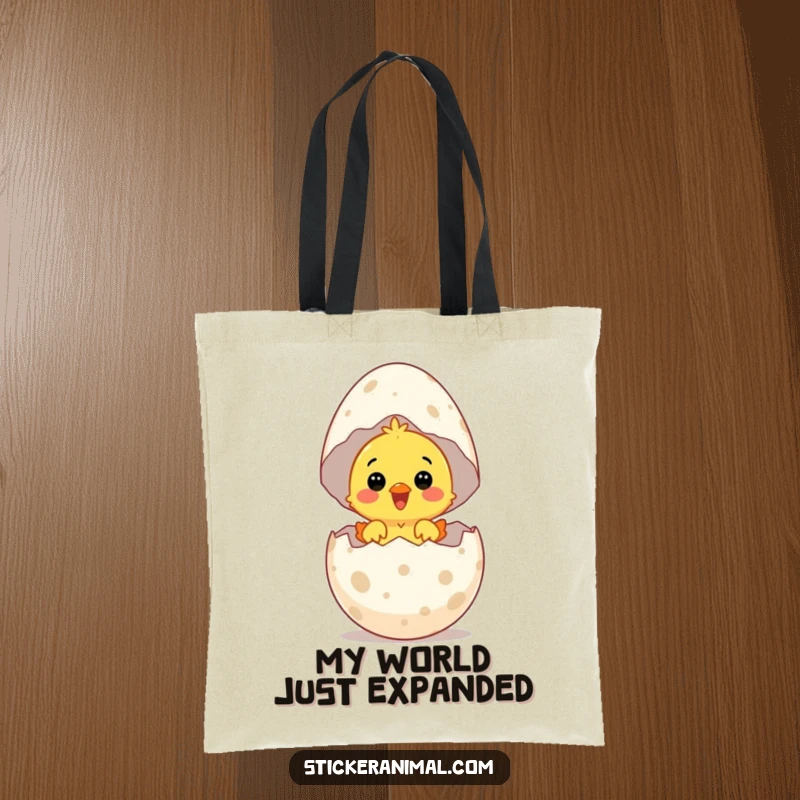 Funny tote bag with a surprised chick hatching from a giant speckled egg with delight, perfect for carrying items.